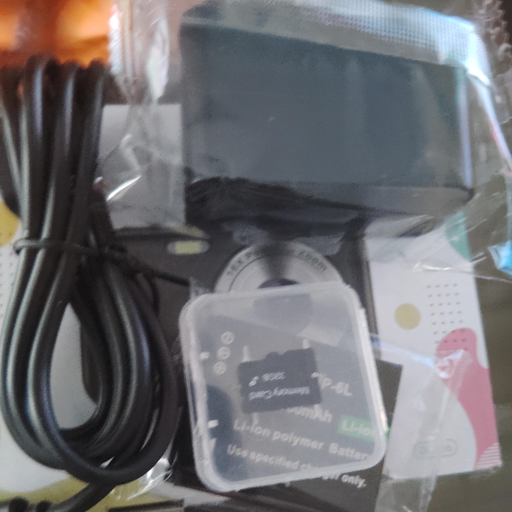 Black Digital Camera With Accessories